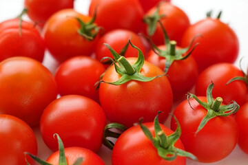 Fototapeta premium Top View of Cherry Tomatoes on Pure White Background