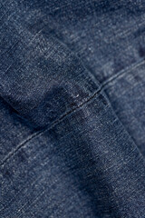 denim for the production of clothing, a piece of denim fabric for the production of clothing close...