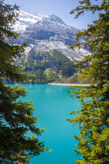 Oeschinensee lake in Switzerland, beautiful destination for hiking in swiss alps