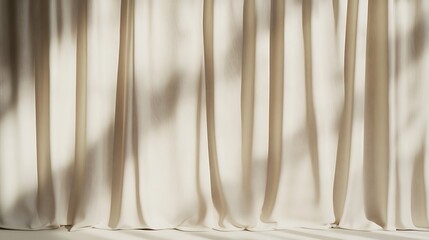 Soft beige fabric curtains gently swaying, casting intricate shadows on a bright, sunny surface, creating a serene and calming atmosphere