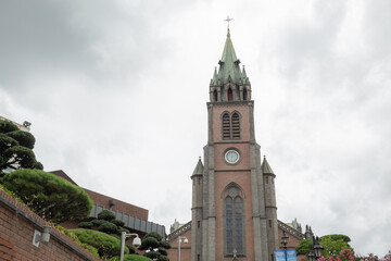 exterior of Myeongdong Cathedral and cloudy sky in seoul