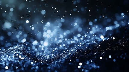 Abstract blue and silver glitter particles shimmering against a dark background creating a dreamy and enchanting atmosphere
