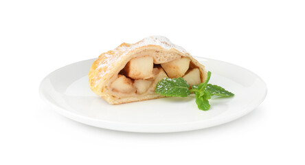 Piece of tasty apple strudel with powdered sugar and mint isolated on white