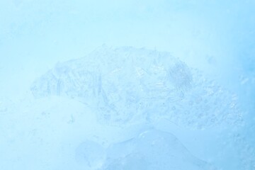 Texture of clear ice as background, closeup