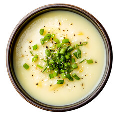 Creamy potato soup with scallions, isolated on white background