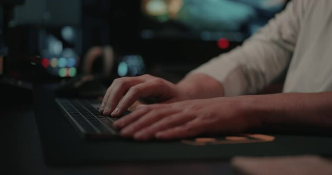 Film editor&rsquo;s Hands typing on a keyboard and mouse