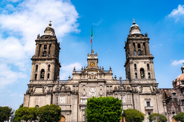 Fototapeta premium Photo of Mexico City Metropolitan Cathedral taken during the late morning with clear blue sky and bright sunlight in Mexico City.