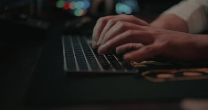 Film editor&rsquo;s Hands typing on a keyboard and mouse