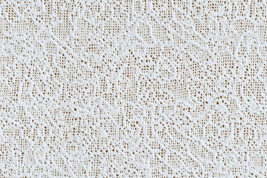 Seamless delicate white Pointelle lace fabric with intricate patterns and textures, showcasing the fine details of the lacework.