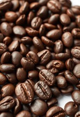 Fototapeta premium Close-up of roasted coffee beans, rich brown hues, isolated on white, background, roasted, high resolution