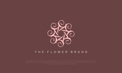 abstract flower mandala logo in hexagon shape.