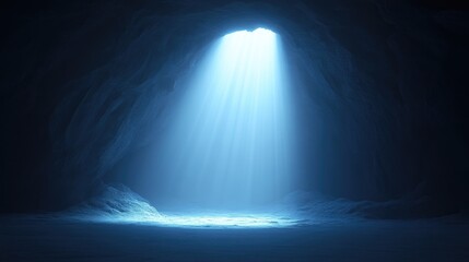 Light piercing dark cave.  Vast interior illuminated by a bright light source