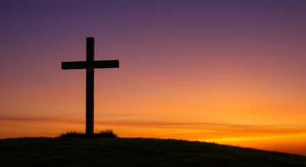 A wooden cross stands on a hill silhouetted against a dramatic sunset sky in shades of orange, purple, and red, symbolizing faith, hope, and spiritual reflection in nature.