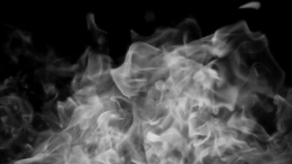 Blurred texture of burn fire with particles embers. Blur flames on isolated black background. Texture overlays for banner,flyer,card .