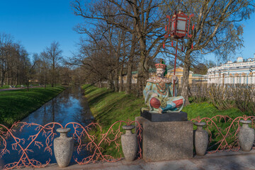 View of the Large Chinese Bridge in Alexander Park in Tsarskoye Selo on a sunny spring day,...