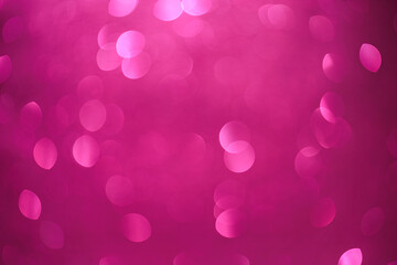 A pink background with many small pink circles