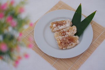 a traditional Southeast Asian dessert beautifully served on a white plate