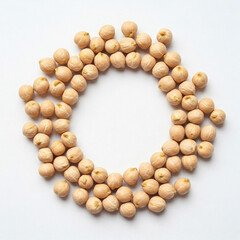 Obraz premium Chickpeas arranged in circle on white background, top view
