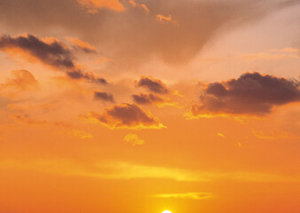 Sunset sky with orange clouds