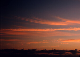 Sunset sky with orange clouds
