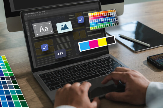 Web Design A developer designs a responsive web app with a modern layout, planning content and coding at a digital workspace doing online web design