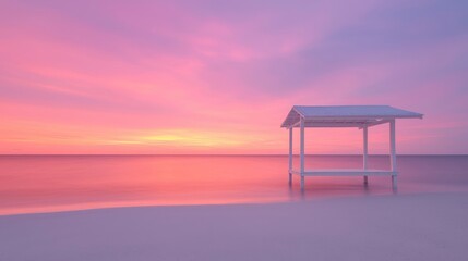 Serene beach sunset with a small white gazebo.  Soft pastel colors paint the sky and sea as the sun dips below the horizon, creating a tranquil atmosphere. A simple white gazebo sits on the shoreline