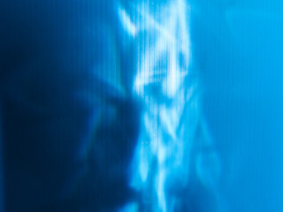 Blue reflection in the dark for abstract energy background