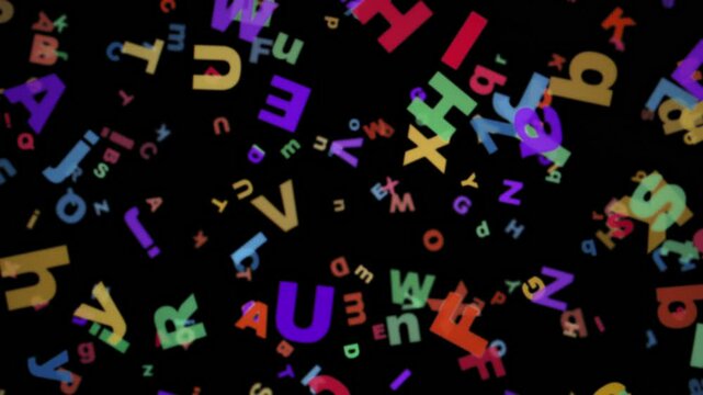 Letters of the English alphabet on a black background, game educational material or online education concept