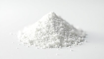 Pile of white granulated sugar on white background, bright, unhealthy