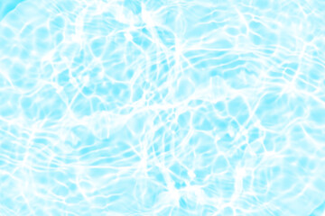 Blue water with ripples on the surface. Defocus blurred transparent blue colored clear calm water surface texture with splashes and bubbles. Water waves with shining pattern texture background.