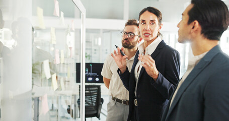 Business, people and meeting with notes on glass for planning, schedule update and problem solving....