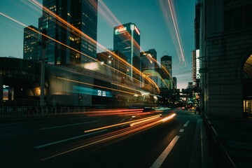 Nighttime Cityscape With Light Trails And Modern Architecture In Urban Japan