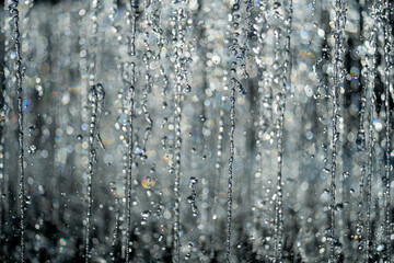 Water drop background. Clear droplet on surface. Dripping water effect. Splashing waters drops....