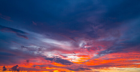Sky on sunrise. Beauty sunrise with sunlight background. Twilight, dramatic sunrise dawn, dusk, sunshine. Cloudy sunset. Sunrise wallpaper. Sky sunset overlay. Peaceful horizon. Panorama of glow sky.