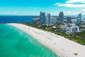Aerial view of Miami Beach skyline. Drone shot of Miami Beach cityscape. Top view of South Miami Beach and the ocean. Miami Beach skyline with skyscrapers and coastline from above.