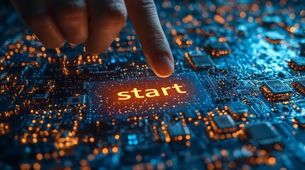 Finger touching start button on circuit board