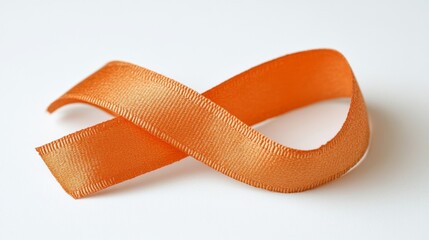 Orange Ribbon Folded Symbolizing Hope and Awareness on a White Background