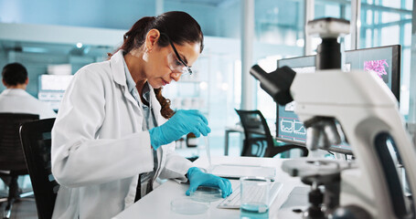 Scientist, woman and petri dish with research for biology, innovation or medical notes analysis....