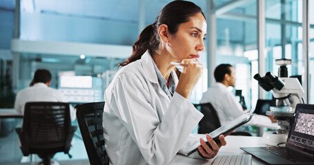 Laptop, science and thinking with woman in laboratory for healthcare, medical or pharmaceutical...