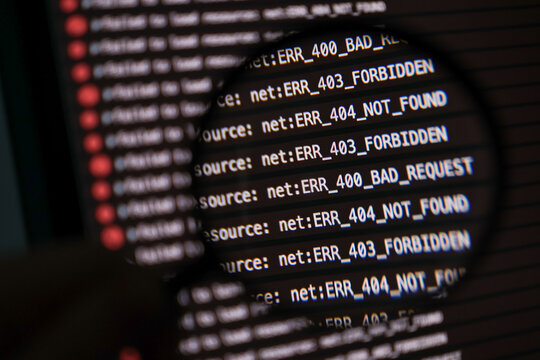 magnified view of http error codes on developer console screen with various 400 403 and 404 status messages indicating access and request issues. soft focus
