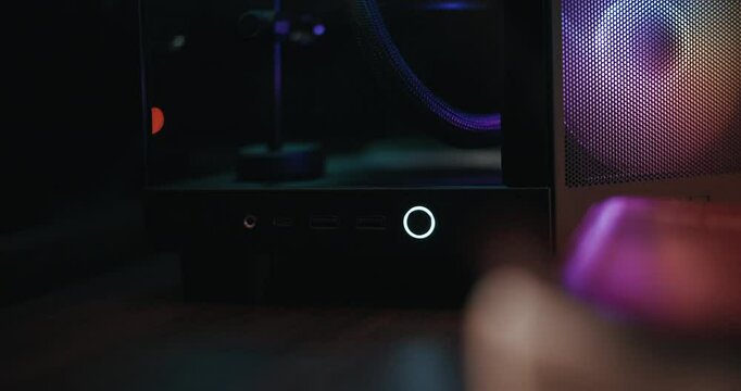 Gaming computer being powered on and fans spinning
