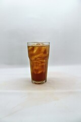 Unsweetened iced tea, known as Es Teh Tawar in Indonesia. A simple, refreshing drink served cold with ice cubes—perfect for cleansing the palate on a hot day.