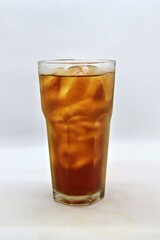 Unsweetened iced tea, known as Es Teh Tawar in Indonesia. A simple, refreshing drink served cold with ice cubes—perfect for cleansing the palate on a hot day.