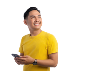 Happy young Asian man holding mobile phone and looking away with big smile isolated on transparent background