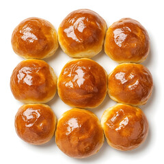 Fluffy and golden brioche buns with a soft, buttery texture and slightly crisp edges, isolated white background