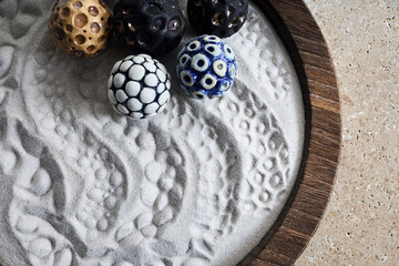 Textured Sand and Patterned Stones