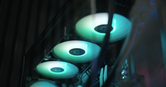 Gaming computer being powered on and fans spinning