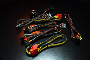 new powerful computer power supply and a set of reinforced wires with connectors