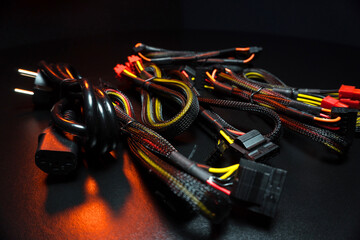 new powerful computer power supply and a set of reinforced wires with connectors