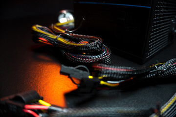 new powerful computer power supply and a set of reinforced wires with connectors